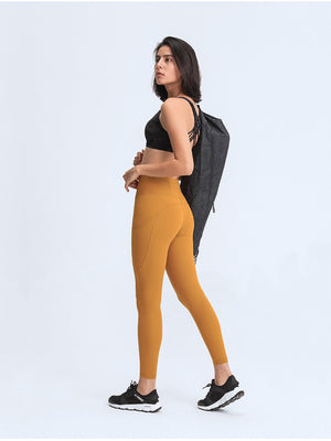 Tie-dye sculpt leggings in tangerine with performance pockets and a high waist.
