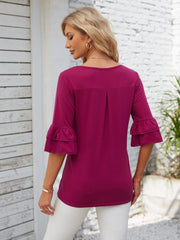 Ruffled sleeve blouse in watermelon pink with a square neckline and back pleat detail.