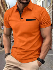 Orange textured polo shirt with black contrast pocket and collar detail.