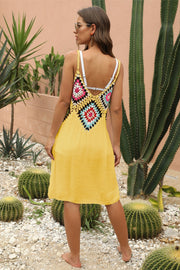 Yellow crochet yoke cover-up dress with colorful granny square detail and spaghetti straps