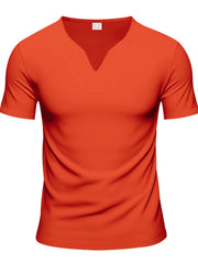 Orange v-neck tee with notched collar and short sleeves.