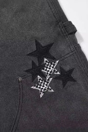 Dark carpenter jeans with embroidered stars, some with checkered pattern detail.