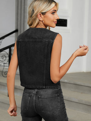 Black denim cropped utility vest with button front and collarless neckline.