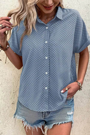 Blue polka dot cuffed short sleeve polyester shirt with button front.
