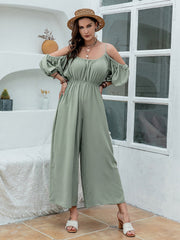 Sage off-shoulder jumpsuit with gathered waist and wide legs, 100% polyester.