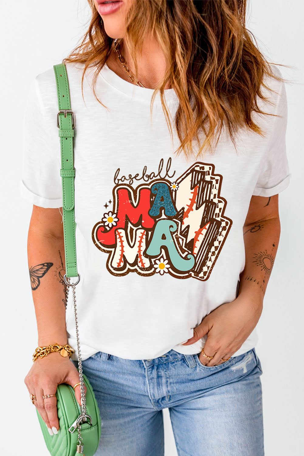 White graphic tee with retro baseball Mama design and daisy accents