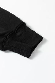 Black collared v-neck sweatshirt sleeve cuff detail