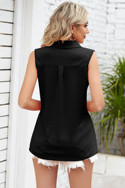 Black collared sleeveless top with a pleat detail on the back.