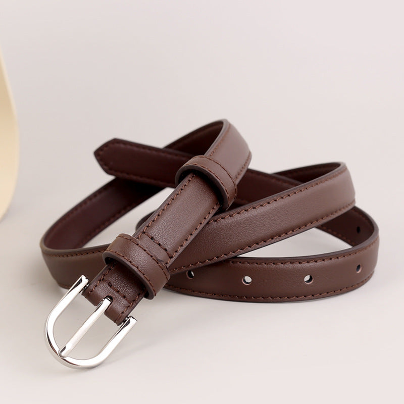Skinny brown leather belt with silver buckle and stitched detail