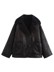 Black aviator jacket with shearling trim and button closure.