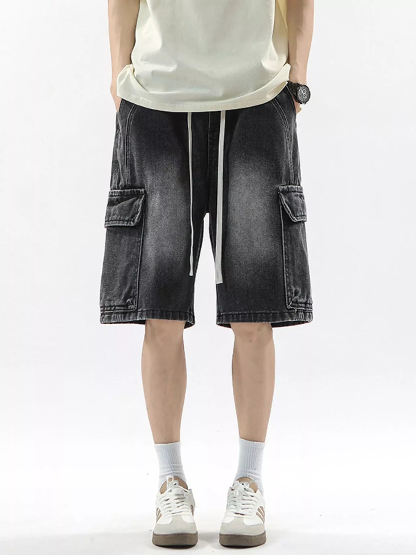 Men's Soot cargo shorts with drawstring and large side pockets.