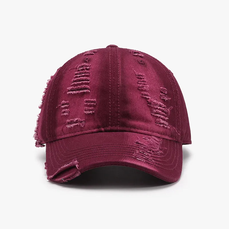 Distressed canvas baseball cap in burgundy with frayed details.
