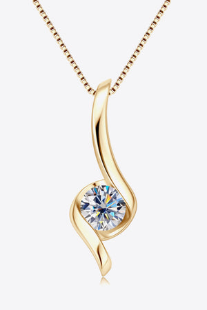Gold moissanite pendant necklace with swirling design and box chain.
