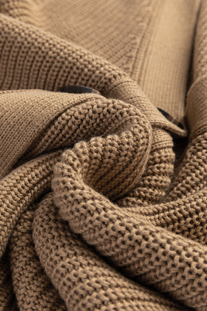 Camel ribbed button-down cardigan vest with visible buttons and textured knit fabric.