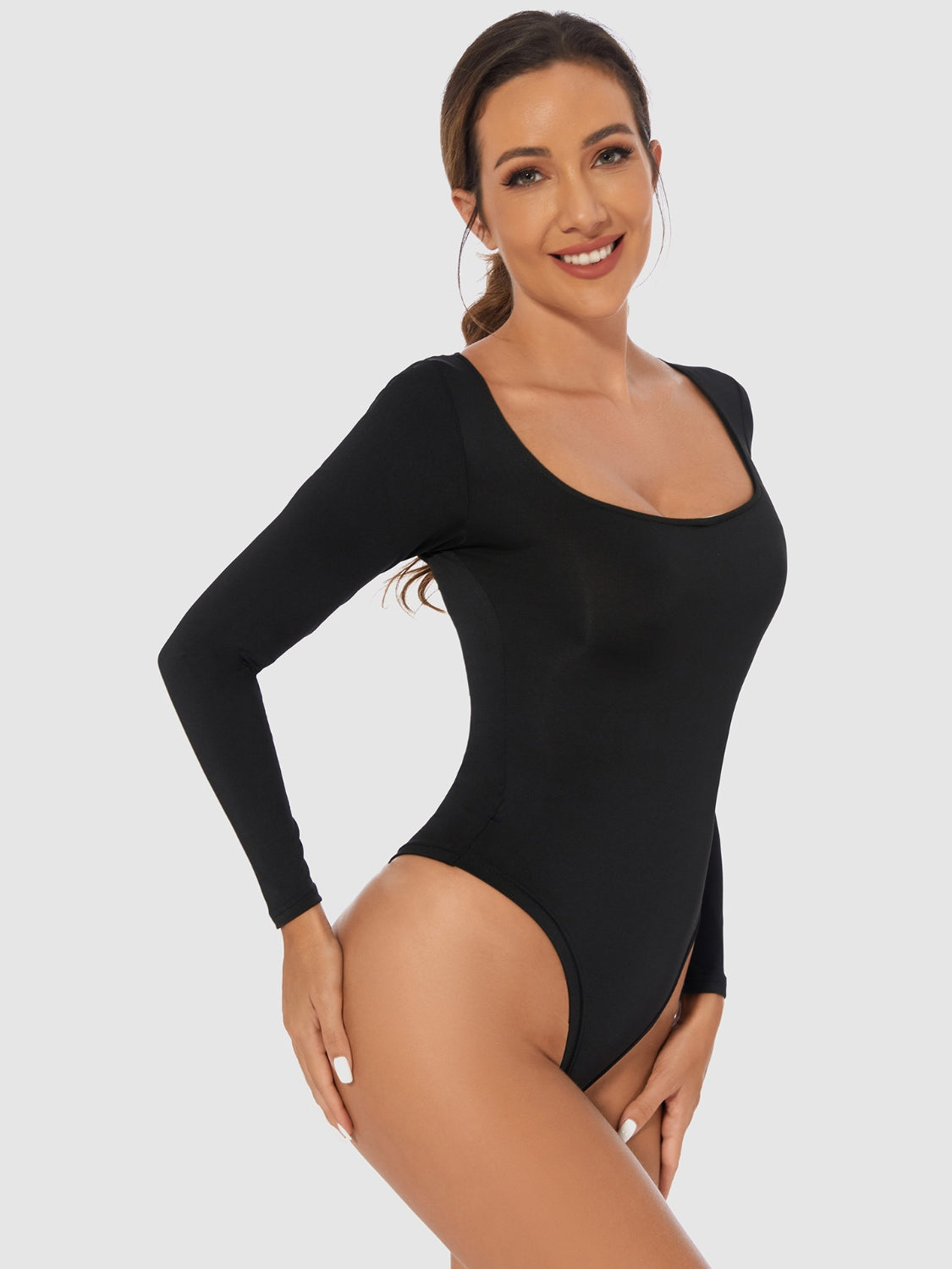 Black long sleeve second-skin bodysuit with a square neckline.