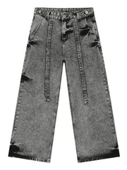 Dark gray acid wash denim jeans with exaggerated wide legs and a tie detail.