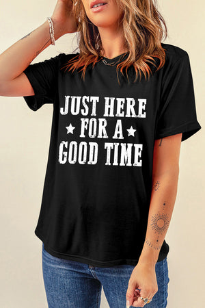 Black graphic t-shirt with distressed white text that reads "JUST HERE FOR A GOOD TIME" and stars.