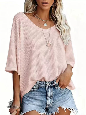 Waffle knit relaxed v-neck t-shirt in Coral Pink with a loose fit and short sleeves.