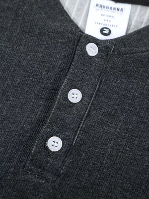 Men's dark gray textured ribbed henley t-shirt with three white buttons and a striped collar detail.