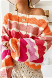 Off-the-shoulder sweater with scalloped stripe pattern in pink, orange, and white acrylic knit.