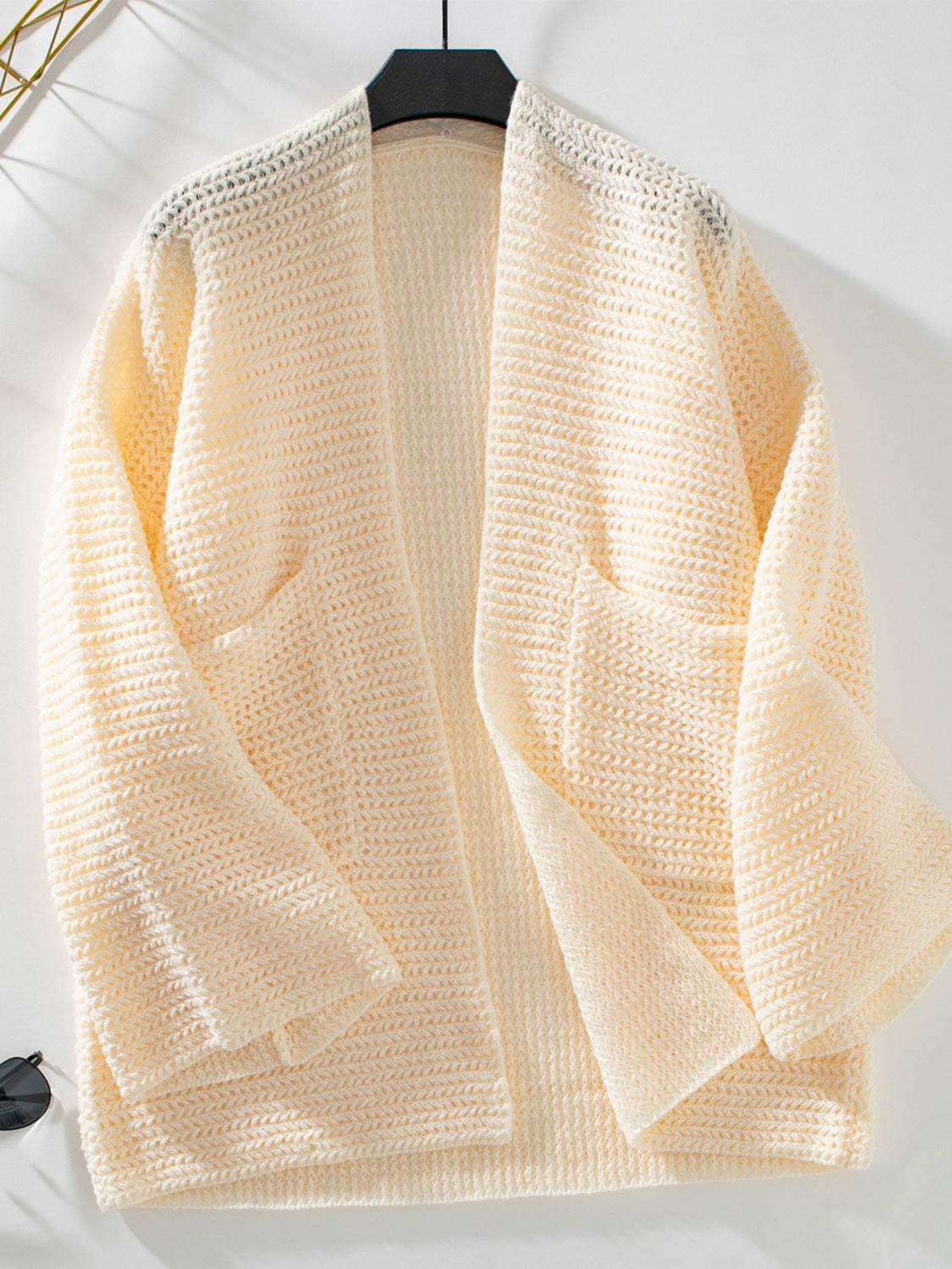Chunky knit open front cardigan in cream with pockets and a relaxed fit.