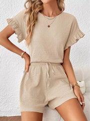 Beige frill sleeve tee and drawstring shorts set with textured fabric.