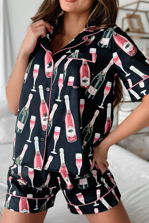 Black silk pajama set with champagne print and pink piping