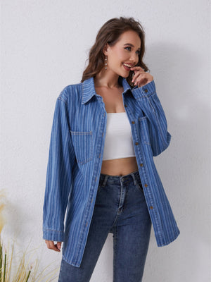 Vertical stripe denim overshirt in medium blue with chest pockets and button front.