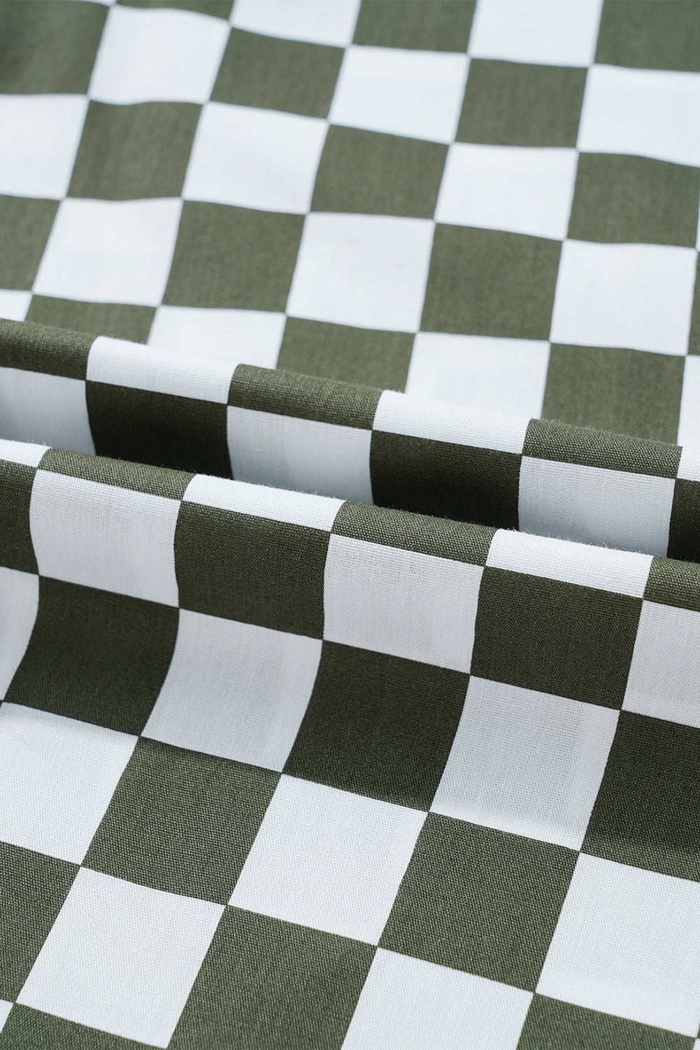 Olive checkered button-down shirt with a breathable fabric.