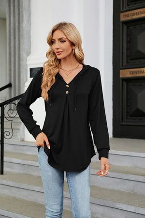 Black hooded henley top with button detail and pleats