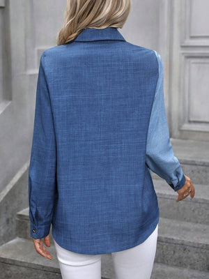 Two-tone denim button-down shirt in blue with a relaxed fit and collared neckline.