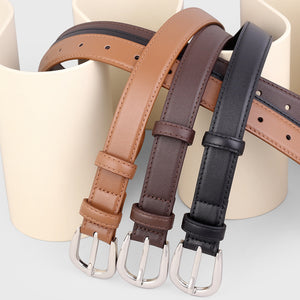Buckle skinny leather belts in brown, coffee brown, and black with silver buckles.