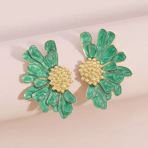 Textured green flower stud earrings with gold center detail.