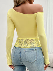 Light yellow off-shoulder blouse with lace trim detail