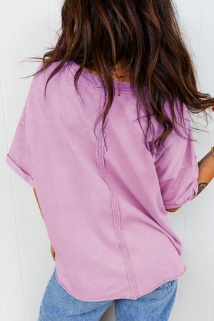 Lilac cotton crew neck t-shirt with raw seam details and rolled sleeves.