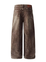 Brown corduroy wide-leg pants with back pockets and a leather logo patch.