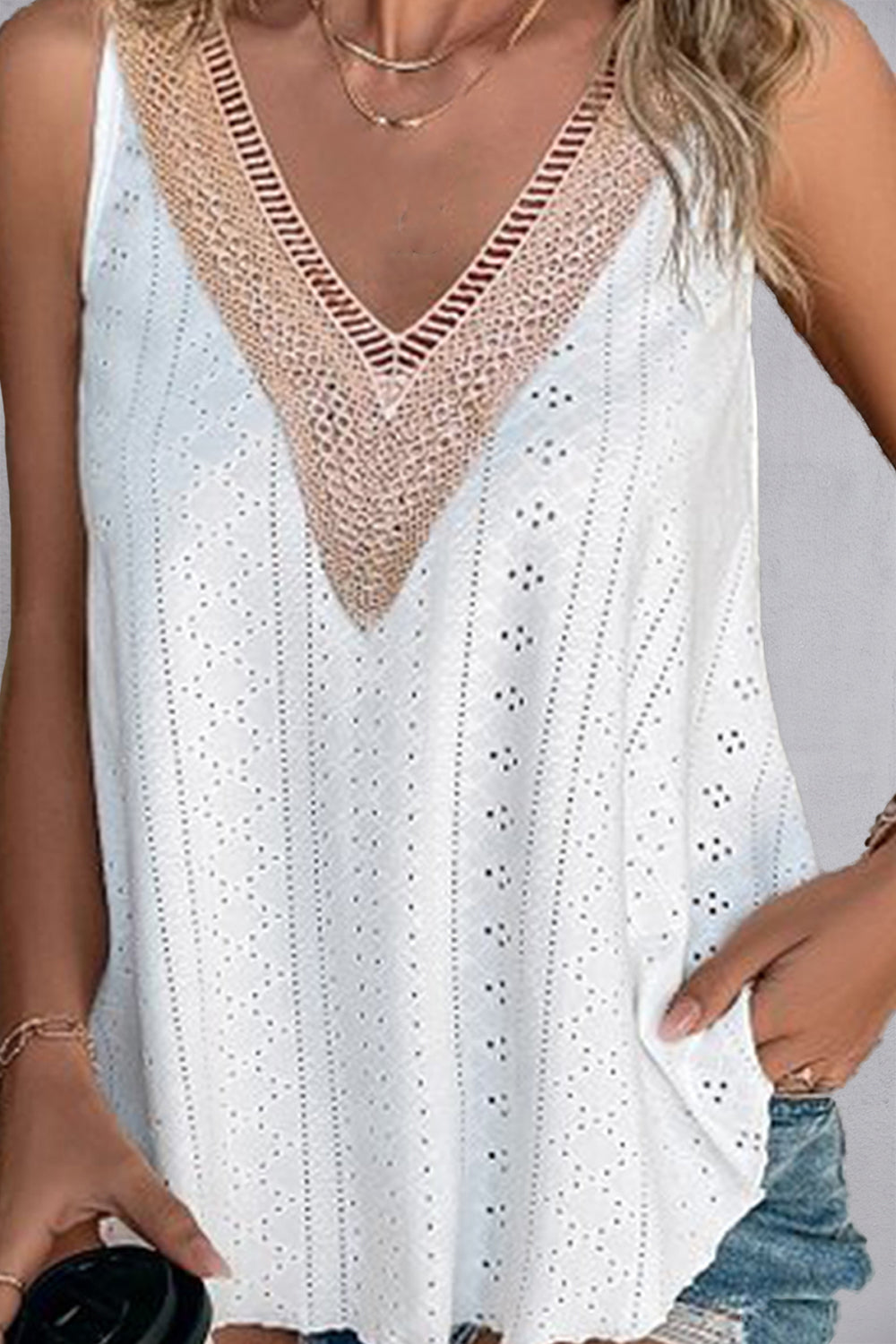 White eyelet inset V-neck tank top with crochet trim detail.