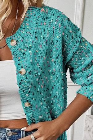 Turquoise confetti knit button-up cardigan with a relaxed fit.