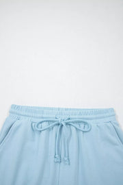 Light blue cotton bikini bottoms with drawstring waist and elastic waistband.