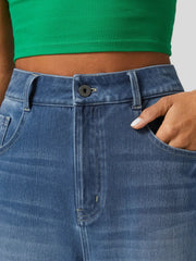 Medium wash wide-leg denim jeans with button fly and contrast cuff detail.