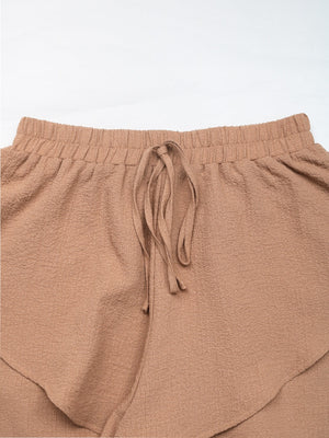 Camel tiered ruffle waistband shorts with drawstring detail