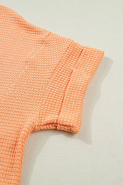 Waffle knit V-neck t-shirt in Sherbet with cuffed short sleeves.