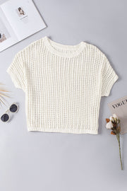 White open-knit slouchy shoulder cover-up with short sleeves and crew neck.