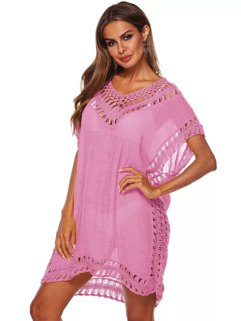 Pink crochet V-neck cover-up dress with fringe trim and cutout details.