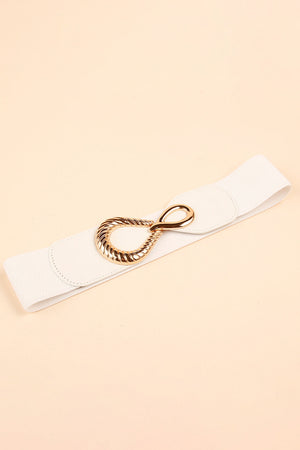 White elasticated waist belt with sculpted gold buckle detail