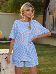 Light blue checkerboard loungewear set with a slouchy t-shirt and shorts.