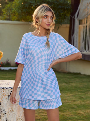 Light blue checkerboard loungewear set with a slouchy t-shirt and shorts.