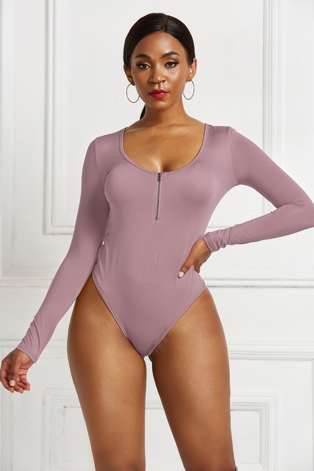 Dusty Pink long sleeve bodysuit with plunge neckline and zip front detail.
