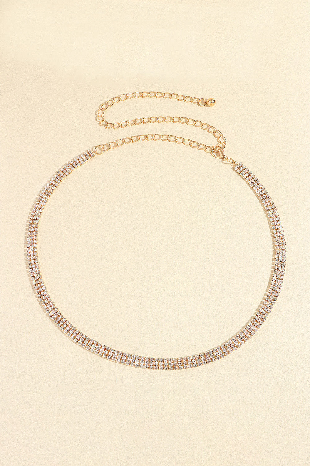Gold triple-row crystal waist chain with adjustable link closure