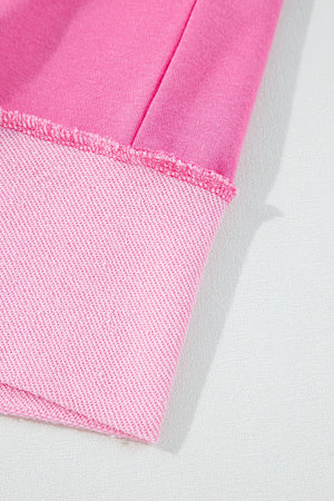 Fuchsia pink cotton loungewear set with contrast trim and raw edge detail.